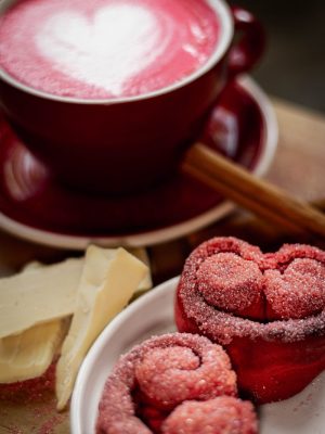 a plate of food and a cup of coffee