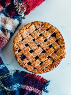brown round woven basket on white table